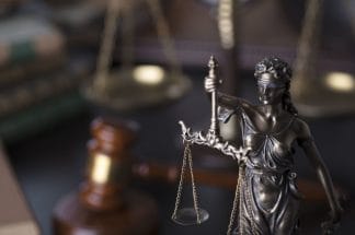 Banco deve indenizar cliente impedida de entrar em agência 1 | Juristas trabalhador